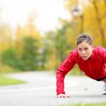 bigstock-woman-doing-push-ups-during-ou-36415972