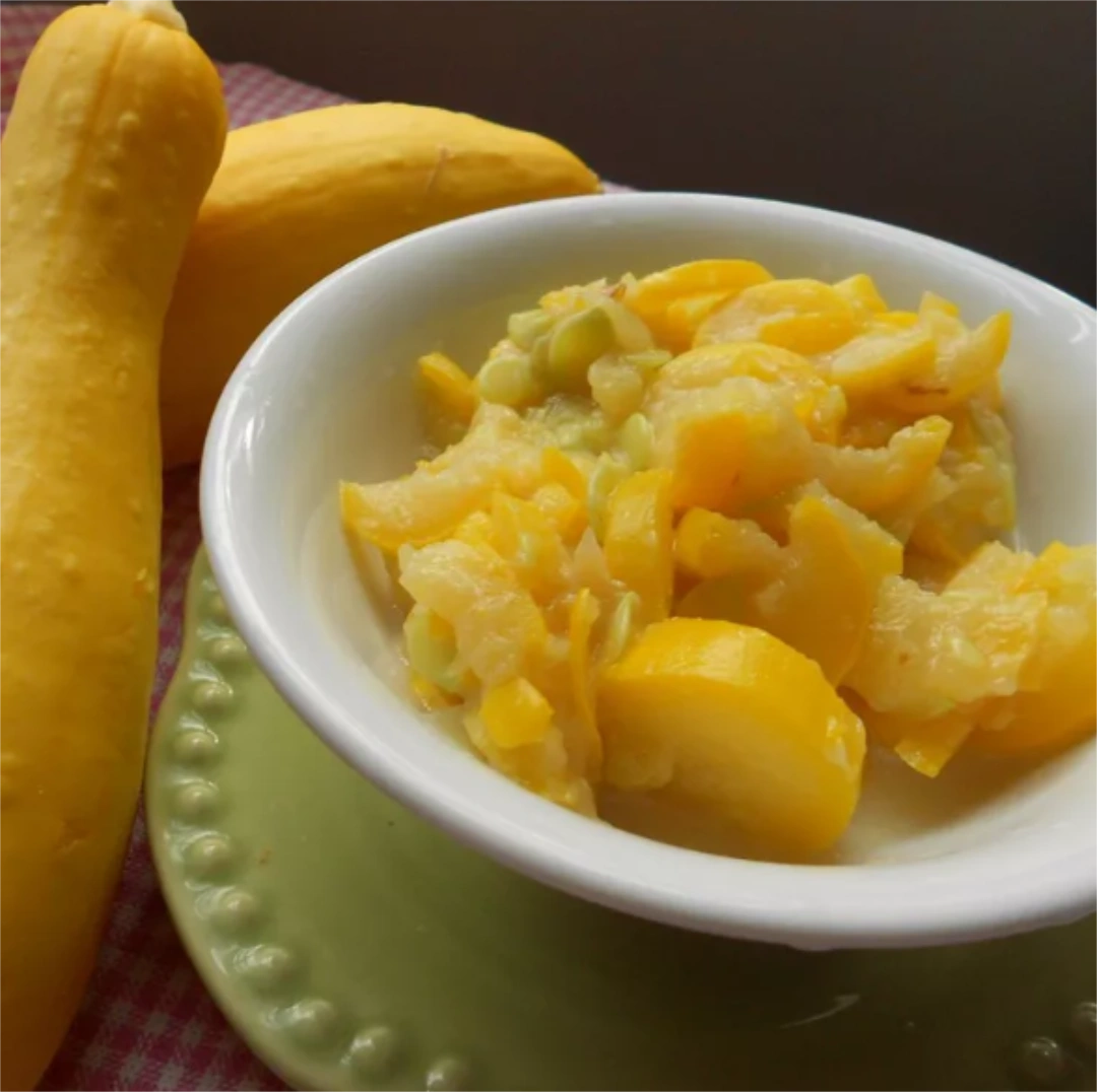 Mashed yellow squash in a bowl