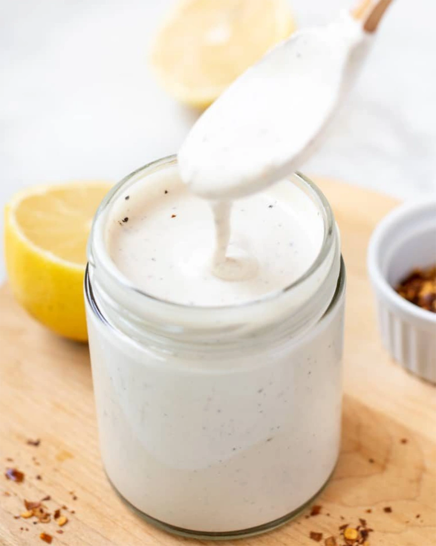 Yogurt tahini dressing in a glass